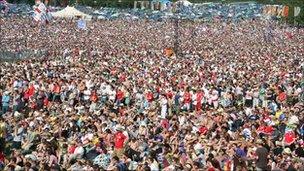 Crowd watching the world cup at Glastonbury Festival 2010