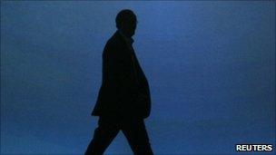 Man in suit in silhouette