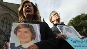 Priest sex abuse victims Barbara Blaine (left) and Barbara Dorris held posters of themselves as children in protests during the Pope's visit in Edinburgh