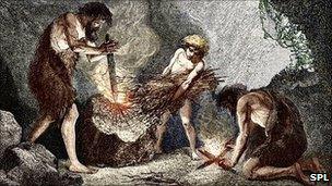 Early humans making fire