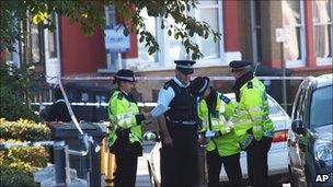 Officers at the site of the killing