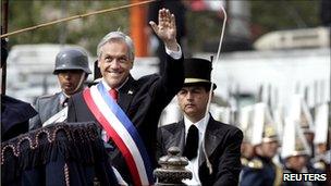 President Sebastian Pinera arrives at a mass to mark Chile's bicentenary accompanied by a military escort.