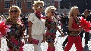 Blonde women march through Riga, Latvia. Photo: May 2010