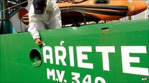 A forensic police officer examines the Ariete fishing trawler in Sicily, 15 September 2010