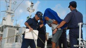 Japanese Coast Guard take Chinese captain Zhan Qixiong into custody (8 September)