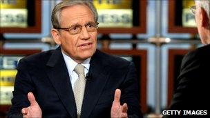 Tom Brokaw (R) listens as Bob Woodward speaks during a taping of 'Meet the Press' at the NBC studios September 14, 2008 in Washington