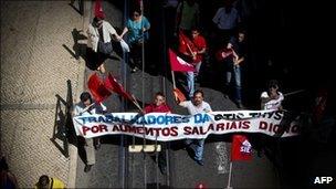 Workers march as they protest against government austerity measures during demonstration