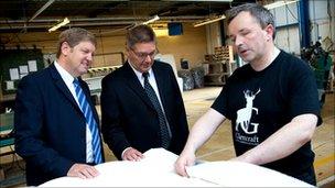 AOGA committee members Doug Sedge and Pat Sibille at the Glencraft factory with employee Colin Middler