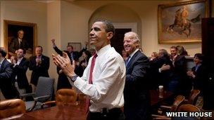 Barack Obama and aides in the White House