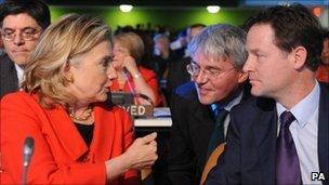 Nick Clegg chatting with US Secretary of State Hilary Clinton and British Secretary of State for International Development Andrew Mitchell