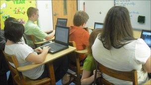 Students at Trinity Christian School using the broadband access to study in class