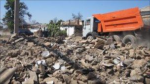 Rubble on streets of Sharq