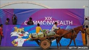 banner being put up in Delhi, India