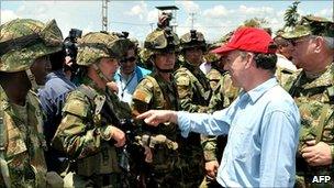 President Juan Manuel Santos meeting soldier who took part in the operation that killed Farc rebel leader Mono Jojoy