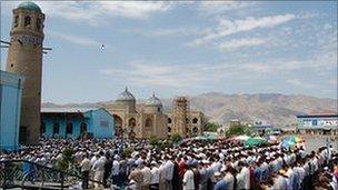 Thousands of worshippers gather for Friday prayers at the central mosque in Khujand in northern Tajikistan