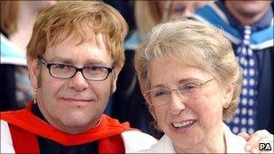 Sir Elton John with his mother in 2002