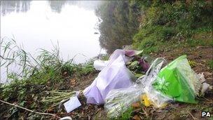 Flowers left next to the River Wharfe where Jimi Heselden died