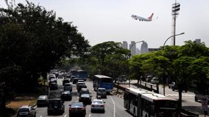 A plane and a busy road