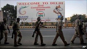 Indian policemen patrol near the Jawaharlal Nehru stadium, in Delhi