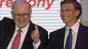 US billionaires Bill Gates (R) and Warren Buffett