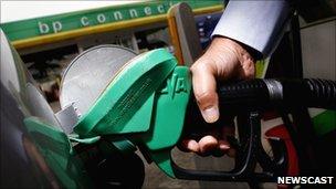 A man refuels at a BP pump station