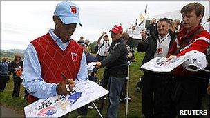 Tiger Woods signs autographs for Ryder Cup fans