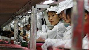 Workers in the Foxconn factory in Longhua, China