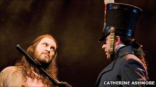 Valjean (David Shannon) and Javert (Earl Carpenter) Photo by Catherine Ashmore