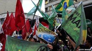 Brazilian supporters of presidential candidate for the Green Party (PV), Marina Silva, wave green flags while supporters of the candidate for the Workers' Party (PT), Dilma Rousseff, wave red flags, Rio de Janeiro, Brazil, on September 29, 2010