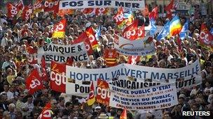 Private and public sector workers demonstrate over pension reforms in Marseille