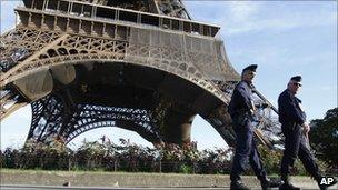 French police officers reinforce security at the Eiffel Tower in Paris after reports of new terror threats, 20 September 2010