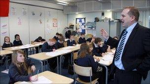 BRISTOL, UNITED KINGDOM - FEBRUARY 24: School pupils at the Bridge Learning Campus listen to their teacher in a classroom at the school on February 24, 2010 in Bristol, England.