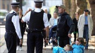 Two Policeman giving directions