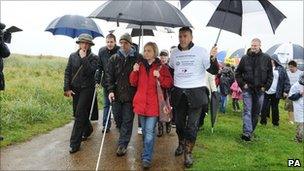 Pc David Rathband with his wife Kath and Duncan Bannatyne on the walk