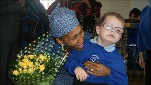 Taliah at Ysgol Hafod Lon presented the queen with flowers