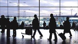 Passengers arrive at Luton airport