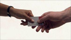 Card being handed over