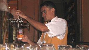 Barman pouring beer in Bar Brahma, Sao Paulo