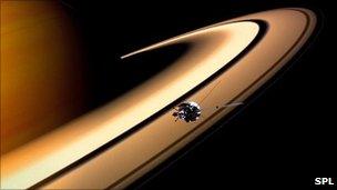 An artist's impression of the Cassini probe approaching Saturn's rings