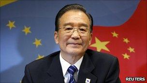 Chinese Premier Wen Jiabao looks on at the start of an EU-China summit at the EU Council in Brussels