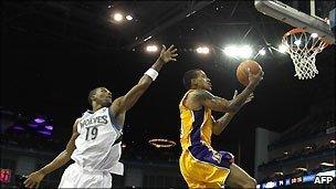 LA Laker's Matt Barnes shoots at the basket against Minnesota Timberwolves in their NBA Europe match at the O2 Arena in London