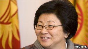 President Roza Otunbayeva speaks to reporters after voting in Bishkek - 10 October 2010