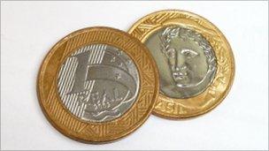 Both sides of Brazil's one-real coin