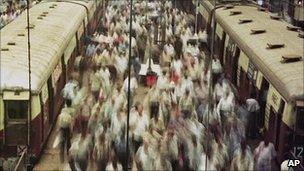 Commuters at a railway station in Bombay (Image: AP)