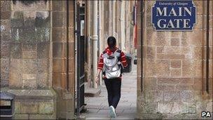 Student walks through Glasgow University campus