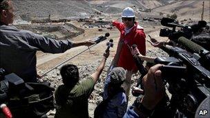 Cristian Barra, cabinet chief of Chile"s Interior Minister, talks with journalists at the San Jose mine in Copiapo, Chile, Sunday, Sept. 26, 2010