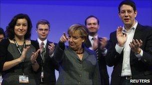 Angela Merkel (centre) among delegates at the congress of the youth wing of the CDU in Potsdam