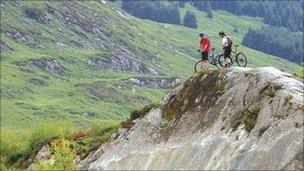 Picture of couple biking in the mountains