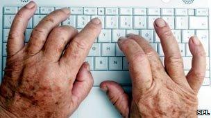 Elderly patient using a keyboard