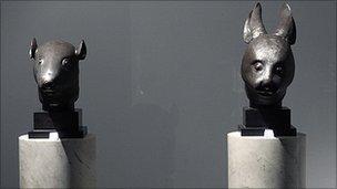 The statues of a rat's head and a rabbit's head, which China says were looted in 1860